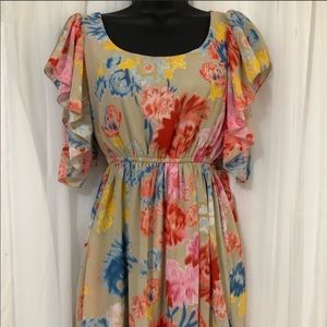 Margot and Sebastian tan pink blue yellow dress